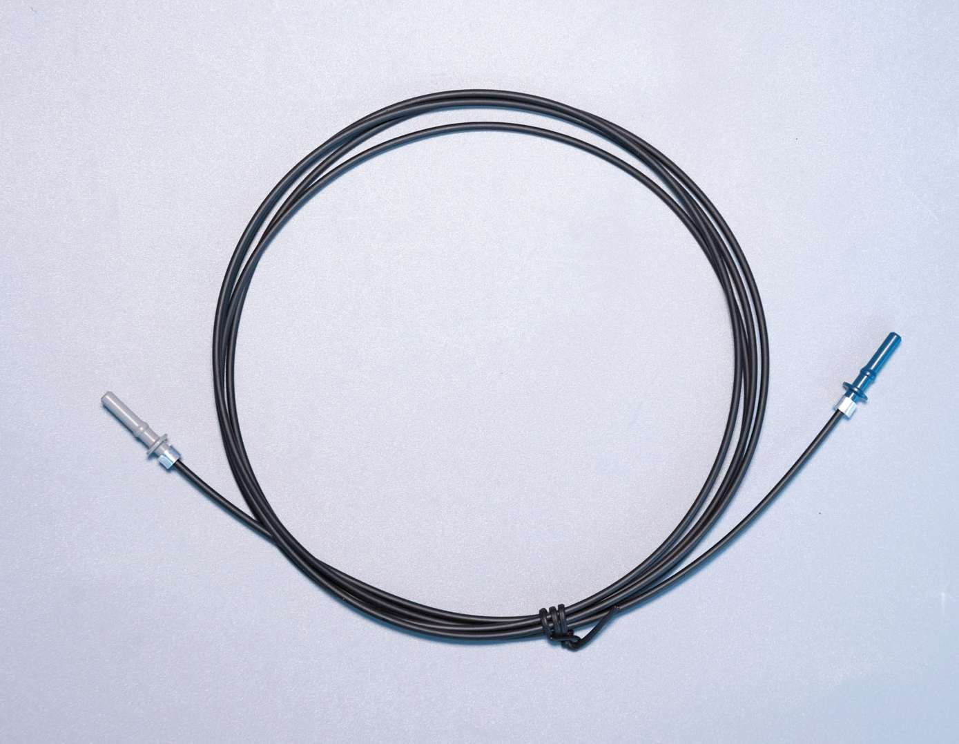 REDIS HFBR-compatible POF patch cord with coiled cable.